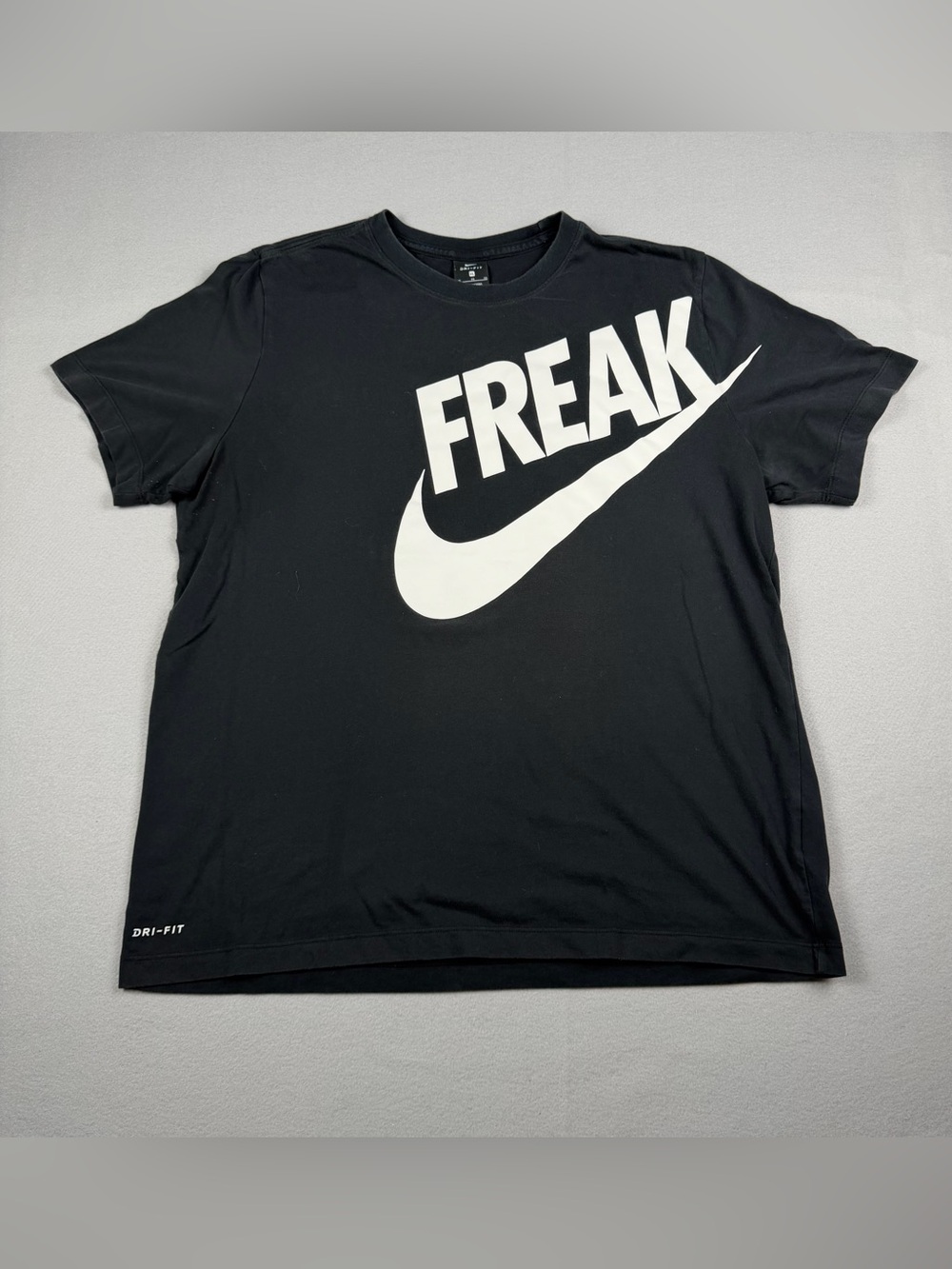 Nike Black Tee with White 'FREAK' and Swoosh Graphic